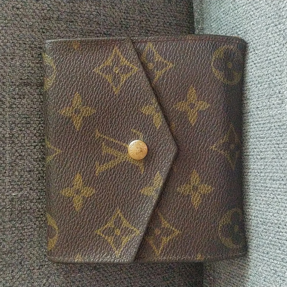 LV bifold double snap wallet COA
